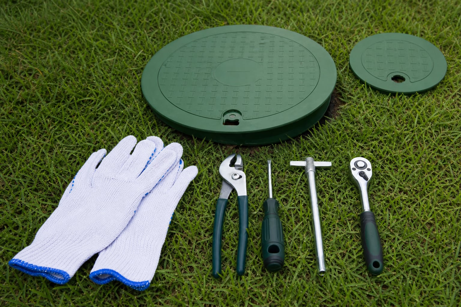 Annual Plant Service — Service kit staged beside plant lids